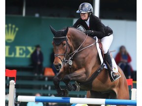 Canada's Amy Millar rode Truman to a fourth-place finish in the CNOOC International Cup at the Spruce Meadows National on Sunday June 9, 2019. Gavin Young/Postmedia