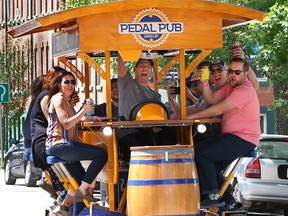 A fully licensed Pedal Pub bike, the first of its kind in Canada, makes its way through Inglewood on Wednesday, June 26, 2019.