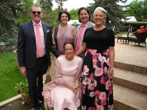 Philanthropist and community leader Ann McCaig celebrated her 80th birthday in style with a huge party on the grounds of her Britannia home. Pictured back row from left are Ann's son John McCaig, daughter Jane McCaig with her husband Rich Waller, and daughter Roxanne McCaig. The fabulous fete raised nearly $120,000 for the Stampede Foundation's youth programs.