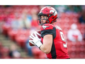 Calgary Stampeders quarterback Nick Arbuckle  looks to throw a pass against the Saskatchewan Roughriders during CFL pre-season football in Calgary on Friday, May 31, 2019. Al Charest/Postmedia