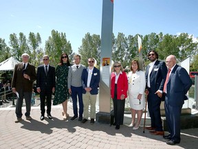 The Southern family and dignitaries gather during the ceremony for the Alberta Champions Field of Fame Six in the plaza area at Spruce Meadows in Calgary on Tuesday, June 4, 2019. The Field of Fame commemorates, recognizes and honours Abertans who have made significant contributions to the community in the city, province and country.  The National competition runs until Sunday afternoon. Jim Wells/Postmedia