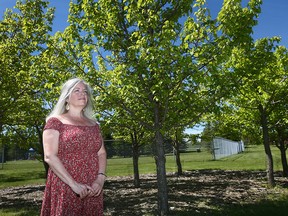 Shannon Miller poses near the future location of Quinterra Legacy Garden in South Glenmore Park in Calgary on Wednesday, June 12, 2019. Miller's daughter Kaiti Perras was one of five young people killed in Brentwood in Calgary on April 15, 2014. (Jim Wells/Postmedia)