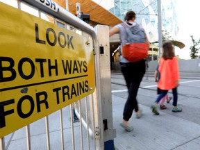 A city report looking at safety enhancements to at-grade LRT crossings suggests an education campaign and undefined annual capital funding.