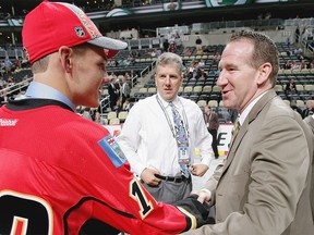 PITTSBURGH, PA - JUNE 23: Matthew Deblouw, drafted 186th overall by the Calgary Flames is greeted by the team during day two of the 2012 NHL Entry Draft at Consol Energy Center on June 23, 2012 in Pittsburgh, Pennsylvania. (Photo by Dave Sandford/NHLI via Getty Images)