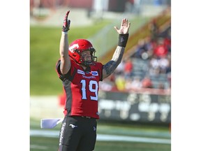 Stamps QB Bo Levi Mitchell celebrates a two-point conversion late in the second quarter during CFL action between the BC Lions and the Calgary Stampeders at McMahon Stadium in Calgary on Saturday. Photo by Jim Wells/Postmedia.
