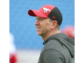 Stampeders head coach Dave Dickenson instructs players during the first session of Calgary Stampeders CFL training camp in Calgary Sunday, May 19, 2019. Jim Wells/Postmedia ders