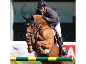 Canada's Eric Lamaze riding Chacco Kid won the AKITA Drilling Cup on day one at the Spruce Meadows Masters on Wednesday September 5, 2018.  Gavin Young/Postmedia