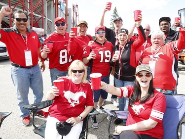 A group of fans give a cheer down at McMahon Stadium prior to the Calgary Stampeders kicking off the 2019 CFL season as they host the Ottawa Redblacks. Saturday, June 15, 2019. Brendan Miller/Postmedia