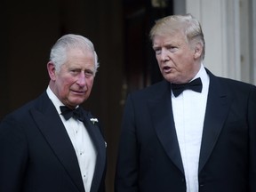 US President Donald Trump and Prince Charles, Prince of Wales pose ahead of a dinner at Winfield House on June 04, 2019 in London, England.