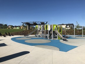 The new park in Crestmont West offers a playground, pergola and picnic tables.