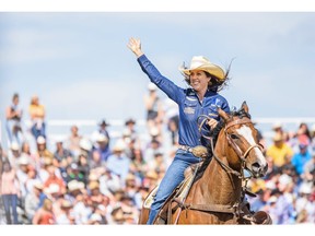 Nellie Miller from Cottonwood, CA., wins the first place in Barrel Racing at Calgary Stampede Rodeo on Saturday. Photo by Azin Ghaffari/Postmedia.