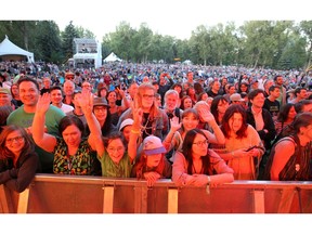 Fans react as Belle & Sebastian perform on the ATB Main Stage during the 40th Annual Calgary Folk Music Festival at Prince's Island Park Thursday, July 25, 2019. Brendan Miller/Postmedia