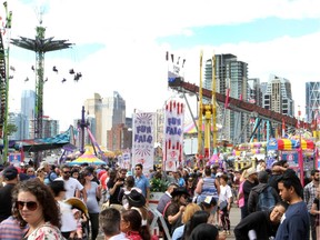 The midway at the Stampede Grounds on Saturday, July 13, 2019. Columnist George Brookman says he heard a lot of hot chatter on the grounds this year.