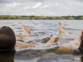 Floating in the salty water of Little Manitou Lake in Saskatchewan. Courtesy, Carey Shaw Photography, Tourism Saskatchewan