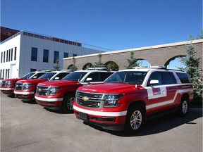 Four Calgary Fire Dpt units which have been taken out of service are parked at #16 Station on 11 St SE in Calgary on Friday, July26, 2019. The Calgary Fire Department is facing budget cuts as part of a larger City of Calgary budget reduction plan. Jim Wells/Postmedia