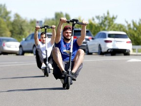 The e-Scooter program and the new BIRD scooters are causing some concerns for motorists and pedestrians in Calgary on Monday, July 29, 2019. Darren Makowichuk/Postmedia