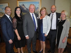 Pictured, centre, at the Distinguished Business Leader Award, co-presented by the Haskayne School of Business and the Calgary Chamber, is 2019 honouree Michael Culbert, vice-chairman of PETRONAS Energy Canada, and his wife Heather. With them at the ceremony are from left: WSP's Justin Morgan and his wife Lindsay Morgan of Clover Oil & Gas, and Secure Energy Services' Sean Culbert and Teine Energy's Ashley Willard.