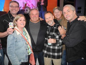 Pictured, from left, at the 7th Annual Village NUTRaiser at Bottlescrew Bill's are Village Brewery's Tom Stuart; Calgary Prostate Cancer Centre executive director Pam Heard; Tony Spoletini; Village Brewery's Jim Button; Gerry Forbes; and Bret Hart. The fun and philanthropic event raised $5,460 for Calgary's Prostate Cancer Centre through the sale of specially crafted pints of prairie oyster ales.