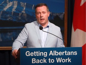 Alberta Premier Jason Kenney speaks to media at a press conference held at McDougall Centre on Tuesday, July 23, 2019.