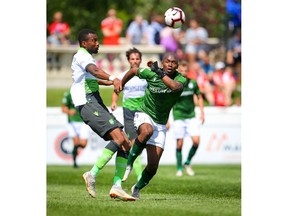 Cavalry FC Jordan Brown battles for the ball against Roger Thompson of the York9 FC during Canadian Premiere League soccer at Spruce Meadows ATCO field in Calgary on Sunday, July 21, 2019. Al Charest / Postmedia