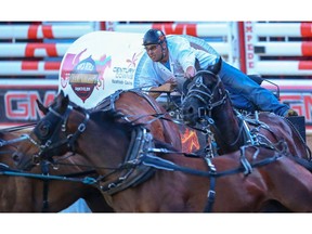 Logan Gorst / Century Downs Racetrack and Casino celebrates wins the 2019 GMC Rangeland Derby championship at Stampede Park in Calgary on Sunday, July 14, 2019. Al Charest / Postmedia