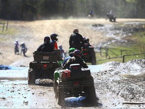 Off-roaders hit the trails on their ATVs at McLean Creek, a popular camping and off-road use area west of Calgary.