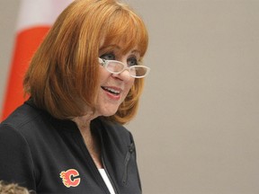 Coun Diane Colley-Urquhart wears a Calgary Flames sticker on her jacket at City Council Tuesday, July 30, 2019. Calgary City Council agreed to proceed with an arena deal. Jim Wells/Postmedia