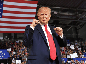 U.S. President Donald Trump arrives for a "Make America Great Again" rally in Greenville, North Carolina, on July 17, 2019.