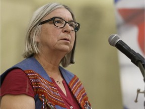 Audrey Poitras, president of the Métis Nation of Alberta, celebrates the signing of the self-governing agreement with the federal government.