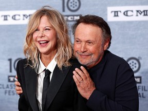 Cast members Billy Crystal and Meg Ryan pose as they arrive for the 30th anniversary screening of comedy movie When Harry Met Sally in Hollywood on April 11, 2019.