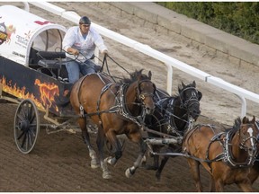 Logan Gorst lead start to finish to win Heat 9 of the Rangeland Derby chuckwagon races at the Calgary Stampede on Saturday. Photo by Mike Drew/Postmedia