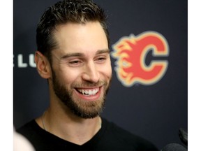 New Calgary Flames goalie Cam Talbot was all smiles as he was introduced to the media in Calgary on Saturday. Photo by Darren Makowichuk/Postmedia.