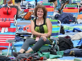 Artistic Director Kerry Clarke poses for a photo during the 40th annual Calgary Folk Music Festival at Prince's Island Park on Sunday, July 28, 2019. Brendan Miller/Postmedia