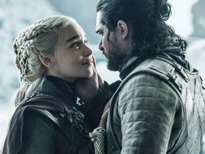 This image released by HBO shows Emilia Clarke in a scene with Kit Harington from the final episode of "Game of Thrones," that aired Sunday, May 19, 2019.
