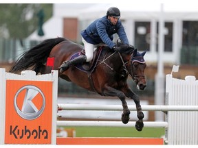 Mexican rider Patricio Pasquel rides Pomerol during the Kubota Cup at the Spruce Meadows North American show jumping competition in Calgary on Thursday July 4, 2019. Gavin Young/Postmedia