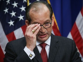 U.S. Labor Secretary Alexander Acosta answers questions on his involvement a prosecutor in a non-prosecution agreement with financier Jeffrey Epstein, who has now been charged with sex trafficking in underage girls, during a news conference at the Labor Department in Washington, U.S., July 10, 2019. REUTERS/Leah Millis