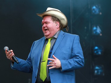 Ted Okos lead vocalist of the band Doug and the Slugs performs to a sold out crowd at the 2019 Stampede Roundup held at Shaw Millennium Park Wednesday, July 10, 2019. Dean Pilling/Postmedia