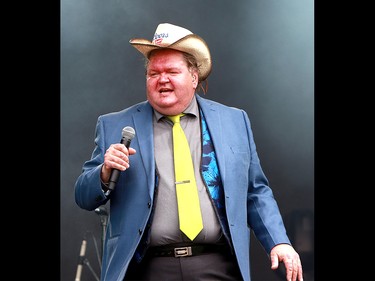 Ted Okos lead vocalist of the band Doug and the Slugs performs to a sold out crowd at the 2019 Stampede Roundup held at Shaw Millennium Park Wednesday, July 10, 2019. Dean Pilling/Postmedia