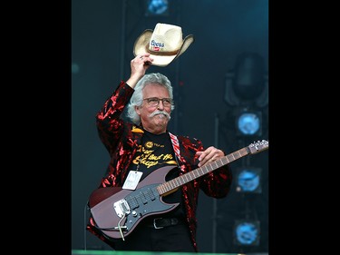 Guitarist t of the band Doug and the Slugs performs to a sold out crowd at the 2019 Stampede Roundup held at Shaw Millennium Park Wednesday, July 10, 2019. Dean Pilling/Postmedia