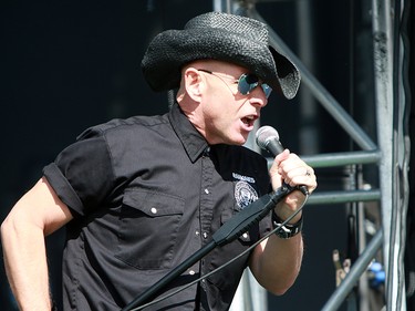 Hugh Dillon, lead singer of the band 'The Headstones', performs to a sold out crowd at the 2019 Stampede Roundup featuring Blondie and Billy Idol, at Shaw Millennium Park Wednesday, July 10, 2019. Dean Pilling/Postmedia