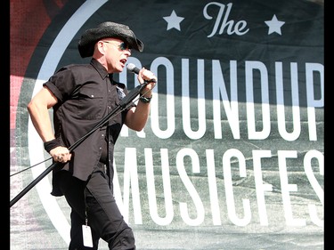 Hugh Dillon, lead singer of the band 'The Headstones', performs to a sold out crowd at the 2019 Stampede Roundup featuring Blondie and Billy Idol, at Shaw Millennium Park Wednesday, July 10, 2019. Dean Pilling/Postmedia