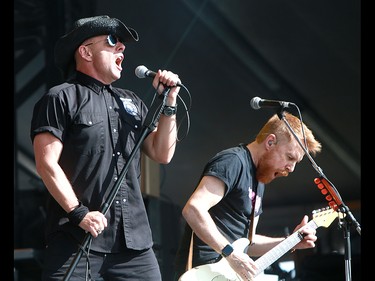 Hugh Dillon, lead singer of the band 'The Headstones', performs to a sold out crowd at the 2019 Stampede Roundup featuring Blondie and Billy Idol, at Shaw Millennium Park Wednesday, July 10, 2019. Dean Pilling/Postmedia