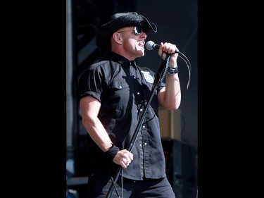 Hugh Dillon, lead singer of the band 'The Headstones', performs to a sold out crowd at the 2019 Stampede Roundup featuring Blondie and Billy Idol, at Shaw Millennium Park Wednesday, July 10, 2019. Dean Pilling/Postmedia