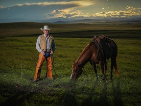 Keith Stewart in his working duds at his ranch southeast of Longview, where he and his family train cutting horses and raise cattle and bison.