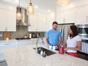 Tyler and Ioana James chose Excel Homes’ Radison model for its beautiful kitchen. They say Heartland is a welcoming community, full of paths, parks and young families.
