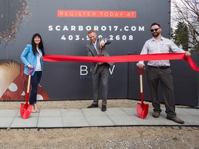 Alexis Meinzer, left, Jason M. Smith and Trevor Cadieux at the ribbon-cutting ceremony for Scarboro 17, a new development in the Scarboro community.