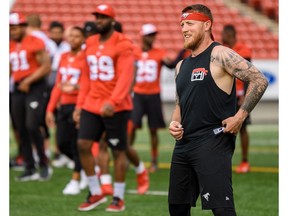 Calgary Stampeders quarterback Bo Levi Mitchell warms up by the field at McMahon Stadium during a team practice on Calgary on Friday, August 2, 2019. Azin Ghaffari/Postmedia Calgary