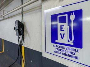 An electric vehicle charging station at a city of Calgary parkade.