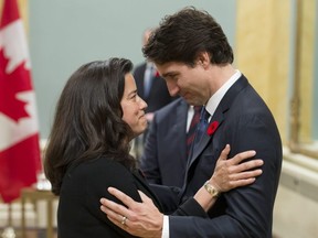 Prime Minister Justin Trudeau speaks with then justice minister Jody Wilson-Raybould during a swearing-in ceremony at Rideau Hall Nov. 4, 2015, in Ottawa.