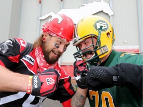 Fans L-R, Tony Fitz and Trroi Whalen have some fun during the tailgate party at the Labour Day Classic at McMahon stadium in Calgary on Monday September 3, 2018. Darren Makowichuk/Postmedia